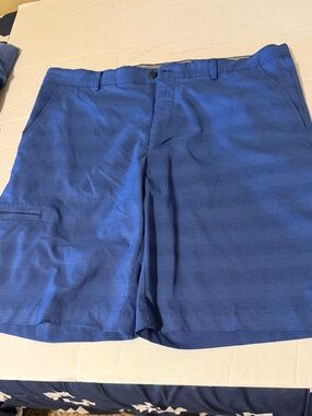 Greg Norman Golf Shorts Mens 36
Performance Blue Active Stretch